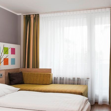 Business & Budget Hotel Tessin Munich Extérieur photo